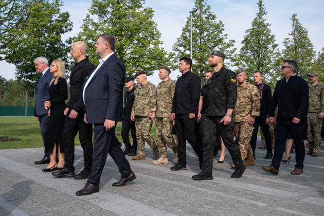 Leaders of the Ukrainian government and the Ukrainian Armed Forces head for the grave during the solemn reburial ceremony of Colonel Yevhen Konovalets, first head of the Organisation of Ukrainian Nationalists (OUN) and colonel of the Army of the Ukrainian People’s Republic (UNR), at the National Military Memorial Cemetery in Kyiv region, Ukraine, August 18, 2026. On August 11, 2026, Konovalets’ remains were exhumed at Crooswijk General Cemetery in Rotterdam, the Netherlands, where they had rested since his assassination by a Soviet agent in May 1938. (Photo by Danylo Antoniuk Ukrinform) Remains of OUN leader Yevhen Konovalets reburied at National Military Memorial Cemetery  Copyright: xDanyloxAntoniukx