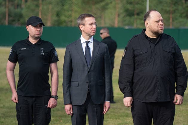 Head of the Office of the President of Ukraine Kyrylo Budanov, Prime Minister of Ukraine Sergii Koretskyi and Speaker of the Verkhovna Rada of Ukraine Ruslan Stefanchuk (L to R) participate in the solemn reburial ceremony of Colonel Yevhen Konovalets, first head of the Organisation of Ukrainian Nationalists (OUN) and colonel of the Army of the Ukrainian People’s Republic (UNR), at the National Military Memorial Cemetery in Kyiv region, Ukraine, August 18, 2026. On August 11, 2026, Konovalets’ remains were exhumed at Crooswijk General Cemetery in Rotterdam, the Netherlands, where they had rested since his assassination by a Soviet agent in May 1938. (Photo by Danylo Antoniuk Ukrinform) Remains of OUN leader Yevhen Konovalets reburied at Nati  Copyright: xDanyloxAntoniukx