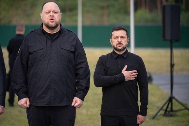 Volodymyr Zelenskyy And Ruslan Stefanchuk At Konovalets Reburial Ceremony - Kyiv region President of Ukraine Volodymyr Zelenskyy (R) and Speaker of the Verkhovna Rada of Ukraine Ruslan Stefanchuk participate in the solemn reburial ceremony of Colonel Yevhen Konovalets, first head of the Organisation of Ukrainian Nationalists (OUN) and colonel of the Army of the Ukrainian People s Republic (UNR), at the National Military Memorial Cemetery in Kyiv region, Ukraine on August 18, 2026. Konovalets remains were exhumed at Crooswijk General Cemetery in Rotterdam, the Netherlands on August 11, 2026, where they had rested since his assassination by a Soviet agent in May 1938. Photo by Danylo Antoniuk Ukrinform ABACAPRESS.COM Kyiv Kyiv Ukraine  Copyright: xUkrinform ABACAx