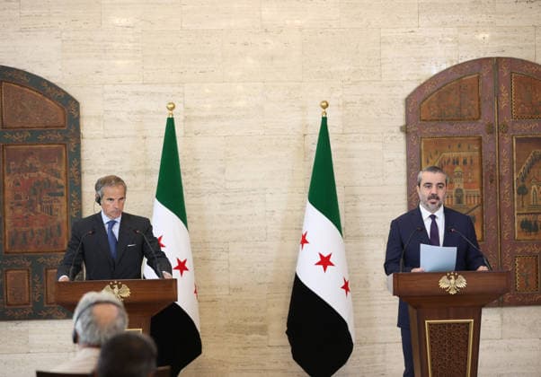 Asaad Hassan al-Shaibani - Mariano Grossi joint press conference in Damascus DAMASCUS, SYRIA - AUGUST 18: Syrian Foreign Minister Asaad Hassan al-Shaibani and International Atomic Energy Agency (IAEA) Director General Rafael Mariano Grossi hold a joint press conference in Damascus, Syria on August 18, 2026. Izz Aldien Alqasem Anadolu Damascus Syria. Editorial use only. Please get in touch for any other usage.  Copyright: x2026xAnadoluxIzzxAldienxAlqasemx