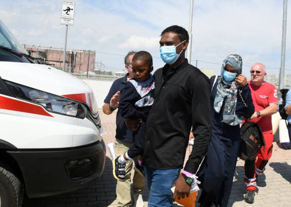 August 18, 2026, Ravenna, Rome, Italy: The NGO ship Humanity 1 has arrived in the port of Ravenna with 73 migrants on board, 15 of whom are minors and five women, one of whom is a minor. Most are from Sudan, with others from Senegal. This is the 28th landing in the port of Ravenna. The photo shows a family disembarking. Ravenna Italy  - ZUMAa289 20260818_zia_a289_002 Copyright: xAgfx
