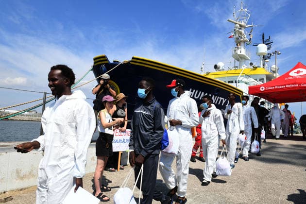 August 18, 2026, Ravenna, Rome, Italy: The NGO ship Humanity 1 has landed in the port of Ravenna with 73 migrants on board, 15 of whom are minors and five women, one of whom is a minor. Most are from Sudan, with others from Senegal. This is the 28th landing in the port of Ravenna. The photo shows a moment of disembarkation. Ravenna Italy  - ZUMAa289 20260818_zia_a289_013 Copyright: xAgfx