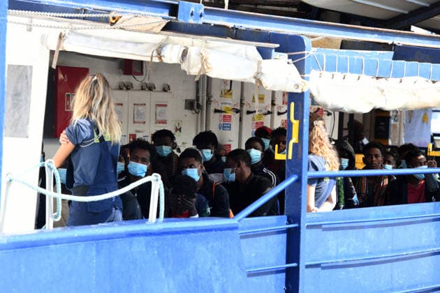 August 18, 2026, Ravenna, Rome, Italy: The NGO ship Humanity 1 has arrived in the port of Ravenna with 73 migrants on board, 15 of whom are minors and five women, one of whom is a minor. Most are from Sudan, with others from Senegal. This is the 28th landing in the port of Ravenna. Pictured is a group of migrants waiting to be disembarked. Ravenna Italy  - ZUMAa289 20260818_zia_a289_032 Copyright: xAgfx
