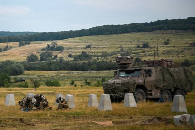 NATO Eagle Spearhead exercise in Romania CINCU, ROMANIA - AUGUST 18: Servicemen participate in the NATO Eagle Spearhead exercise at the Getica National Training Center in Cincu, Brasov County, Romania, on August 18, 2026. Alex Nicodim Anadolu Cincu Romania. Editorial use only. Please get in touch for any other usage.  Copyright: x2026xAnadoluxAlexxNicodimx