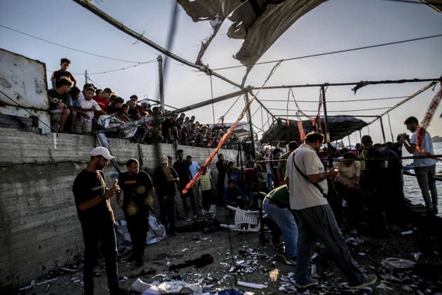 Israeli drone strike on crowded Gaza cafe kills 6 Palestinians GAZA CITY, GAZA, PALESTINE - AUGUST 18: Palestinians gather around destroyed beachfront cafe in Gaza City, Gaza, Palestine on August 18, 2026, following an Israeli airstrike that killed at least six people, including a child, and injured more than 12 others. The attack on the civilian gathering spot occurred despite recent calls from U.S. President Donald Trump urging Israel to halt its military operations across the Gaza Strip, as local rescue teams worked to retrieve victims from the damaged structure. Saeed M. M. T. Jaras Anadolu Gaza City Gaza. Editorial use only. Please get in touch for any other usage.  Copyright: x2026xAnadoluxSaeedxM.xM.xT.xJarasx