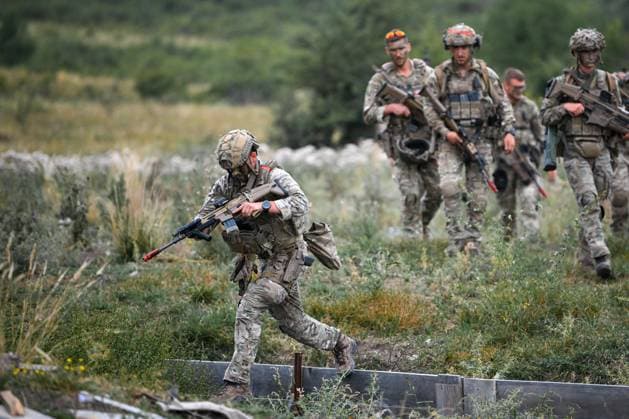 NATO Eagle Spearhead exercise in Romania CINCU, ROMANIA - AUGUST 18: Servicemen in action during the NATO Eagle Spearhead exercise, at the Getica National Training Center in Cincu, Brasov county, Romania, 18 August, 2026. Alex Nicodim Anadolu Cincu Romania. Editorial use only. Please get in touch for any other usage.  Copyright: x2026xAnadoluxAlexxNicodimx