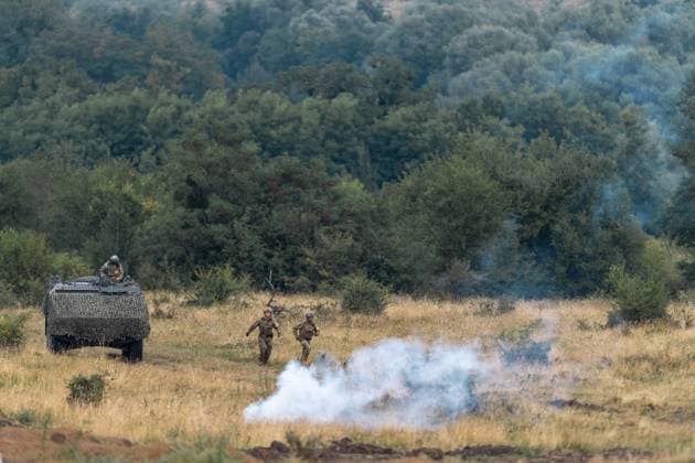 NATO Eagle Spearhead exercise in Romania CINCU, ROMANIA - AUGUST 18: Servicemen in action during the NATO Eagle Spearhead exercise, at the Getica National Training Center in Cincu, Brasov county, Romania, 18 August, 2026. Alex Nicodim Anadolu Cincu Romania. Editorial use only. Please get in touch for any other usage.  Copyright: x2026xAnadoluxAlexxNicodimx