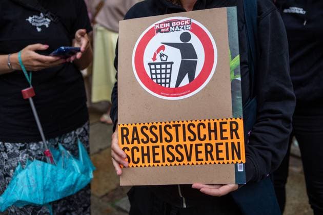 August 18, 2026, Leipzig, Saxony, Germany: LEIPZIG, GERMANY - AUGUST 18, 2026: Demonstrators gathered at the Naschmarkt in LeipzigÃ¢â‚¬â ¢s city centre to protest against an Alternative for Germany (AfD) campaign event being held at the historic Alte HandelsboÂ¶rse. Around 350 people took part in the demonstration against the far-right party, carrying numerous signs and banners expressing their opposition to the AfD and its political agenda. Leipzig Germany - ZUMAq101 20260818_zna_q101_150 Copyright: xMariaxCastrox