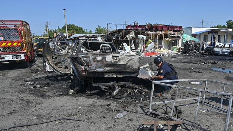 Aftermath of Russian attack in Kharkiv KHARKIV, UKRAINE - AUGUST 18: A view of destruction after the Russians fired two Banderole missiles at a cafe and a store in the center of the village of Pechenigi in the Kharkiv region in Russia, on August 18, 2026. Ten civilians were killed, and at least 18 were injured. Seven cars were burned, 15 were damaged, and 10 private homes, a post office, and five stores were damaged. Serhii Masin Anadolu Kharkiv Ukraine. Editorial use only. Please get in touch for any other usage.  Copyright: x2026xAnadoluxSerhiixMasinx