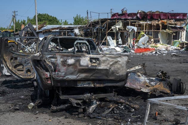 Aftermath of Russian attack in Kharkiv KHARKIV, UKRAINE - AUGUST 18: A view of destruction after the Russians fired two Banderole missiles at a cafe and a store in the center of the village of Pechenigi in the Kharkiv region in Russia, on August 18, 2026. Ten civilians were killed, and at least 18 were injured. Seven cars were burned, 15 were damaged, and 10 private homes, a post office, and five stores were damaged. Serhii Masin Anadolu Kharkiv Ukraine. Editorial use only. Please get in touch for any other usage.  Copyright: x2026xAnadoluxSerhiixMasinx
