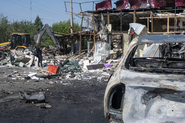 Aftermath of Russian attack in Kharkiv KHARKIV, UKRAINE - AUGUST 18: A view of destruction after the Russians fired two Banderole missiles at a cafe and a store in the center of the village of Pechenigi in the Kharkiv region in Russia, on August 18, 2026. Ten civilians were killed, and at least 18 were injured. Seven cars were burned, 15 were damaged, and 10 private homes, a post office, and five stores were damaged. Serhii Masin Anadolu Kharkiv Ukraine. Editorial use only. Please get in touch for any other usage.  Copyright: x2026xAnadoluxSerhiixMasinx