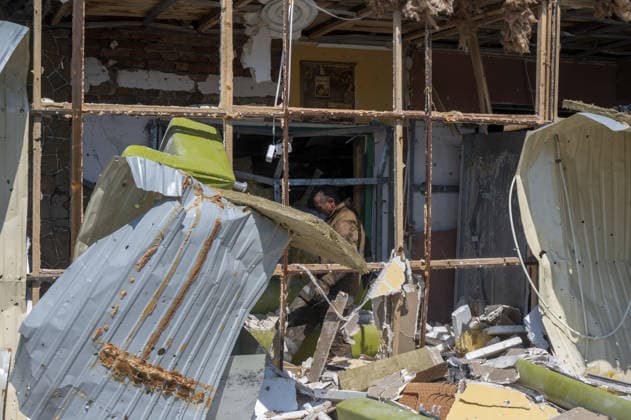 Aftermath of Russian attack in Kharkiv KHARKIV, UKRAINE - AUGUST 18: A view of destruction after the Russians fired two Banderole missiles at a cafe and a store in the center of the village of Pechenigi in the Kharkiv region in Russia, on August 18, 2026. Ten civilians were killed, and at least 18 were injured. Seven cars were burned, 15 were damaged, and 10 private homes, a post office, and five stores were damaged. Serhii Masin Anadolu Kharkiv Ukraine. Editorial use only. Please get in touch for any other usage.  Copyright: x2026xAnadoluxSerhiixMasinx