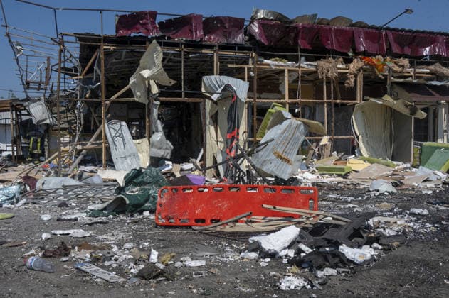 Aftermath of Russian attack in Kharkiv KHARKIV, UKRAINE - AUGUST 18: A view of destruction after the Russians fired two Banderole missiles at a cafe and a store in the center of the village of Pechenigi in the Kharkiv region in Russia, on August 18, 2026. Ten civilians were killed, and at least 18 were injured. Seven cars were burned, 15 were damaged, and 10 private homes, a post office, and five stores were damaged. Serhii Masin Anadolu Kharkiv Ukraine. Editorial use only. Please get in touch for any other usage.  Copyright: x2026xAnadoluxSerhiixMasinx