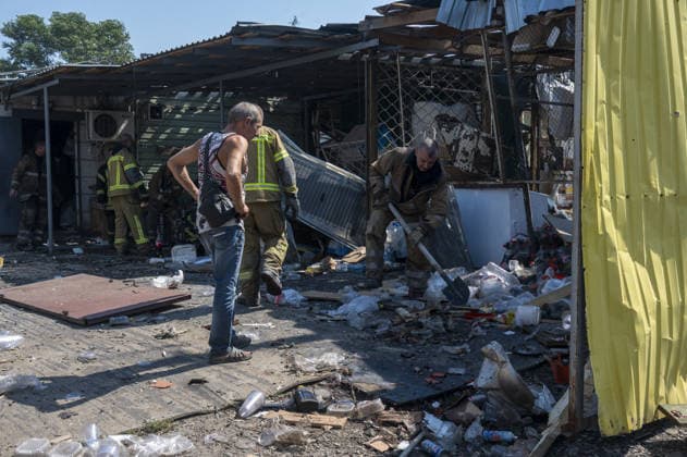 Aftermath of Russian attack in Kharkiv KHARKIV, UKRAINE - AUGUST 18: A view of destruction after the Russians fired two Banderole missiles at a cafe and a store in the center of the village of Pechenigi in the Kharkiv region in Russia, on August 18, 2026. Ten civilians were killed, and at least 18 were injured. Seven cars were burned, 15 were damaged, and 10 private homes, a post office, and five stores were damaged. Serhii Masin Anadolu Kharkiv Ukraine. Editorial use only. Please get in touch for any other usage.  Copyright: x2026xAnadoluxSerhiixMasinx