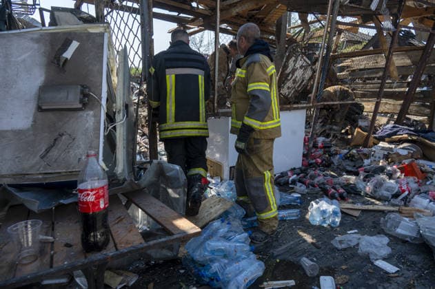 Aftermath of Russian attack in Kharkiv KHARKIV, UKRAINE - AUGUST 18: A view of destruction after the Russians fired two Banderole missiles at a cafe and a store in the center of the village of Pechenigi in the Kharkiv region in Russia, on August 18, 2026. Ten civilians were killed, and at least 18 were injured. Seven cars were burned, 15 were damaged, and 10 private homes, a post office, and five stores were damaged. Serhii Masin Anadolu Kharkiv Ukraine. Editorial use only. Please get in touch for any other usage.  Copyright: x2026xAnadoluxSerhiixMasinx