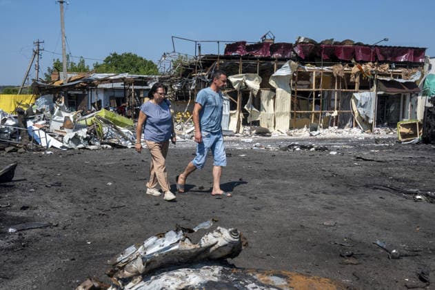 Aftermath of Russian attack in Kharkiv KHARKIV, UKRAINE - AUGUST 18: A view of destruction after the Russians fired two Banderole missiles at a cafe and a store in the center of the village of Pechenigi in the Kharkiv region in Russia, on August 18, 2026. Ten civilians were killed, and at least 18 were injured. Seven cars were burned, 15 were damaged, and 10 private homes, a post office, and five stores were damaged. Serhii Masin Anadolu Kharkiv Ukraine. Editorial use only. Please get in touch for any other usage.  Copyright: x2026xAnadoluxSerhiixMasinx