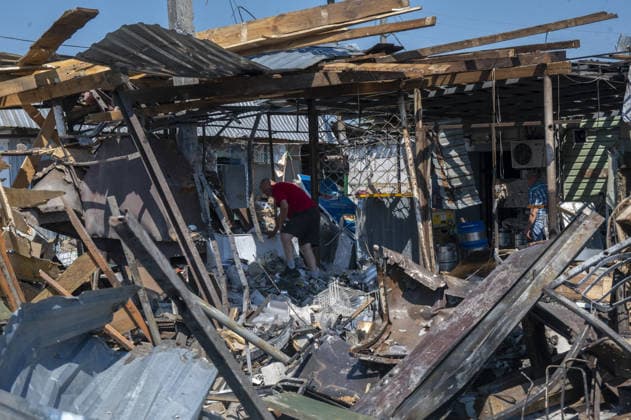 Aftermath of Russian attack in Kharkiv KHARKIV, UKRAINE - AUGUST 18: A view of destruction after the Russians fired two Banderole missiles at a cafe and a store in the center of the village of Pechenigi in the Kharkiv region in Russia, on August 18, 2026. Ten civilians were killed, and at least 18 were injured. Seven cars were burned, 15 were damaged, and 10 private homes, a post office, and five stores were damaged. Serhii Masin Anadolu Kharkiv Ukraine. Editorial use only. Please get in touch for any other usage.  Copyright: x2026xAnadoluxSerhiixMasinx