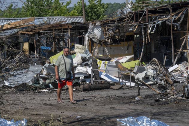Aftermath of Russian attack in Kharkiv KHARKIV, UKRAINE - AUGUST 18: A view of destruction after the Russians fired two Banderole missiles at a cafe and a store in the center of the village of Pechenigi in the Kharkiv region in Russia, on August 18, 2026. Ten civilians were killed, and at least 18 were injured. Seven cars were burned, 15 were damaged, and 10 private homes, a post office, and five stores were damaged. Serhii Masin Anadolu Kharkiv Ukraine. Editorial use only. Please get in touch for any other usage.  Copyright: x2026xAnadoluxSerhiixMasinx