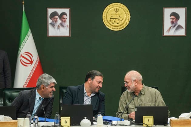 Tehran Iran Virtual Parliament Iranian Parliament Speaker Mohammad Bagher Ghalibaf talks with officials during a virtual parliamentary session in Tehran, Iran on August 18, 2026. Iran s parliament held the public session remotely under emergency provisions, with 247 lawmakers participating. Tehran Tehran Iran Copyright: xHamedxMalekpourx