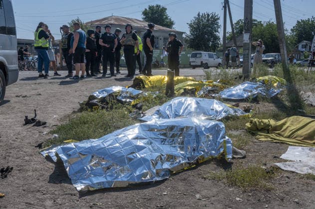 Aftermath of Russian attack in Kharkiv KHARKIV, UKRAINE - AUGUST 18: Rescue workers and residents clear the area after the Russians fired two Banderole missiles at a cafe and a store in the center of the village of Pechenigi in the Kharkiv region in Russia, on August 18, 2026. Ten civilians were killed, and at least 18 were injured. Seven cars were burned, 15 were damaged, and 10 private homes, a post office, and five stores were damaged. Serhii Masin Anadolu Kharkiv Ukraine. Editorial use only. Please get in touch for any other usage.  Copyright: x2026xAnadoluxSerhiixMasinx