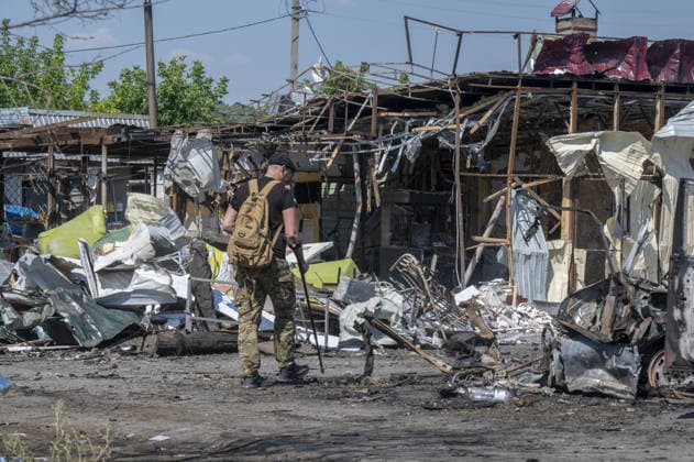 Aftermath of Russian attack in Kharkiv KHARKIV, UKRAINE - AUGUST 18: A view of destruction after the Russians fired two Banderole missiles at a cafe and a store in the center of the village of Pechenigi in the Kharkiv region in Russia, on August 18, 2026. Ten civilians were killed, and at least 18 were injured. Seven cars were burned, 15 were damaged, and 10 private homes, a post office, and five stores were damaged. Serhii Masin Anadolu Kharkiv Ukraine. Editorial use only. Please get in touch for any other usage.  Copyright: x2026xAnadoluxSerhiixMasinx