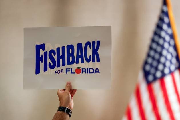 August 18, 2026, Tampa, Florida, USA: A person holds up a sign for Florida Republican primary gubernatorial candidate James Fishback during his watch party at the Hilton Tampa Airport Westshore on Tuesday, Aug. 18, 2026, in Tampa. Tampa USA - ZUMAs70_ 20260818_zan_s70_130 Copyright: xJeffereexWoox