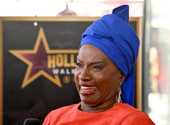 Five-time Grammy-winning Beninese musician, actress, and activist Angelique Kidjo speaks with reporters during an unveiling ceremony honoring her with the 2,854th star on the Hollywood Walk of Fame in Los Angeles on Tuesday, August 18, 2026.  LAP2026081817 JIMxRUYMEN