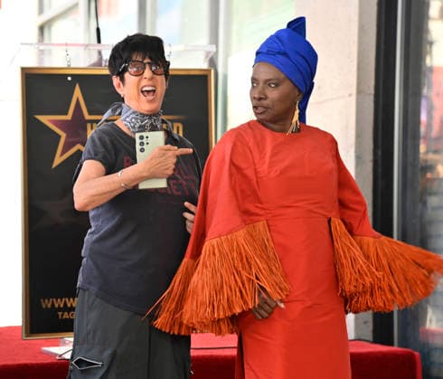 Five-time Grammy-winning Beninese musician, actress, and activist Angelique Kidjo is joined by songwriter Diane Warren during an unveiling ceremony honoring her with the 2,854th star on the Hollywood Walk of Fame in Los Angeles on Tuesday, August 18, 2026.  LAP2026081819 JIMxRUYMEN