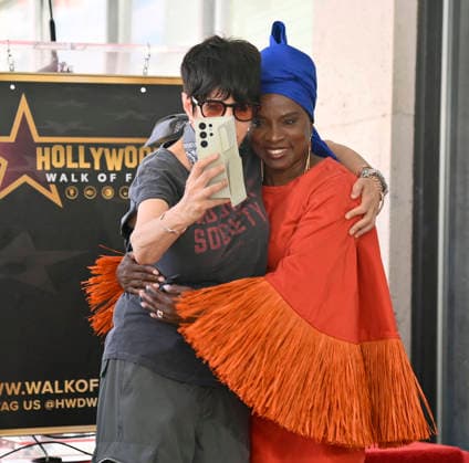 Five-time Grammy-winning Beninese musician, actress, and activist Angelique Kidjo is joined by songwriter Diane Warren during an unveiling ceremony honoring her with the 2,854th star on the Hollywood Walk of Fame in Los Angeles on Tuesday, August 18, 2026.  LAP2026081823 JIMxRUYMEN