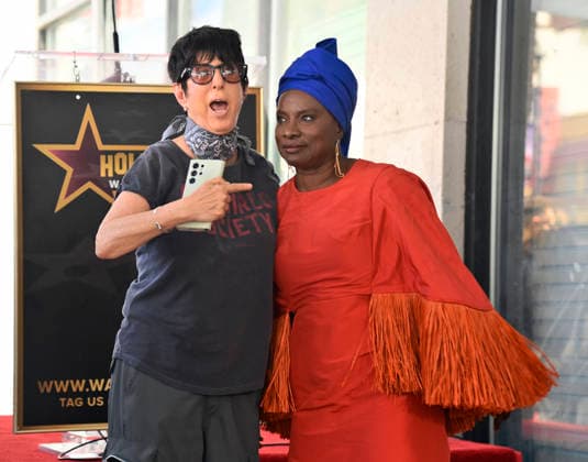 Five-time Grammy-winning Beninese musician, actress, and activist Angelique Kidjo is joined by songwriter Diane Warren during an unveiling ceremony honoring her with the 2,854th star on the Hollywood Walk of Fame in Los Angeles on Tuesday, August 18, 2026.  LAP2026081824 JIMxRUYMEN