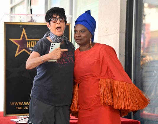 Five-time Grammy-winning Beninese musician, actress, and activist Angelique Kidjo is joined by songwriter Diane Warren (L) during an unveiling ceremony honoring her with the 2,854th star on the Hollywood Walk of Fame in Los Angeles on Tuesday, August 18, 2026.  LAP2026081825 JIMxRUYMEN