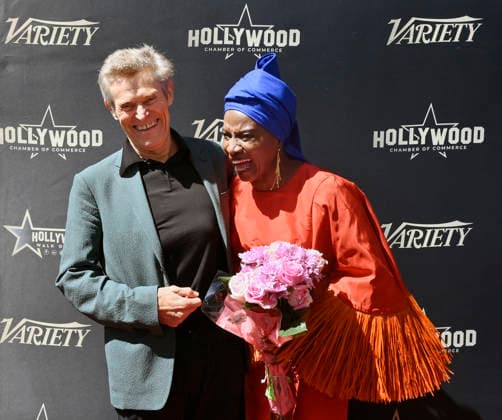 Five-time Grammy-winning Beninese musician, actress, and activist Angelique Kidjo is joined by actor Willem Dafoe (L) looks on during an unveiling ceremony honoring her with the 2,854th star on the Hollywood Walk of Fame in Los Angeles on Tuesday, August 18, 2026.  LAP2026081831 JIMxRUYMEN