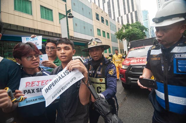 August 19, 2026, Quezon City, Quezon, Philippines: A protest made up of youth groups and progressive sectoral groups marched along the streets of Bonifacio Global City toward the headquarters of the BCDA to reject the proposed Pax Silica. Quezon City Philippines - ZUMAy102 20260819_zip_y102_003 Copyright: xKenosisxYapx