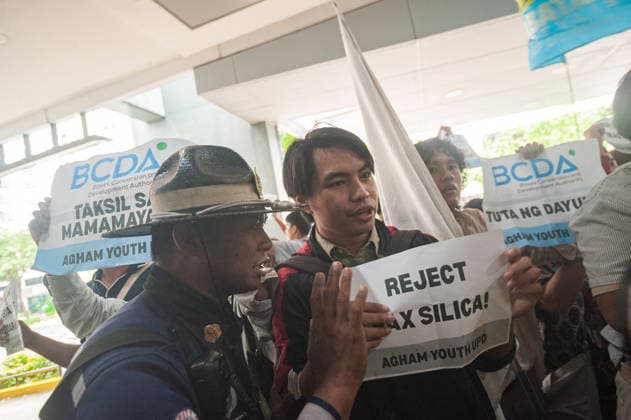 August 19, 2026, Quezon City, Quezon, Philippines: A protest made up of youth groups and progressive sectoral groups marched along the streets of Bonifacio Global City toward the headquarters of the BCDA to reject the proposed Pax Silica. Quezon City Philippines - ZUMAy102 20260819_zip_y102_004 Copyright: xKenosisxYapx
