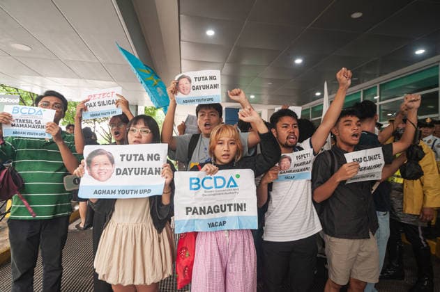 August 19, 2026, Quezon City, Quezon, Philippines: A protest made up of youth groups and progressive sectoral groups marched along the streets of Bonifacio Global City toward the headquarters of the BCDA to reject the proposed Pax Silica. Quezon City Philippines - ZUMAy102 20260819_zip_y102_006 Copyright: xKenosisxYapx