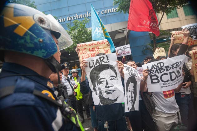 August 19, 2026, Quezon City, Quezon, Philippines: A protest made up of youth groups and progressive sectoral groups marched along the streets of Bonifacio Global City toward the headquarters of the BCDA to reject the proposed Pax Silica. Quezon City Philippines - ZUMAy102 20260819_zip_y102_010 Copyright: xKenosisxYapx