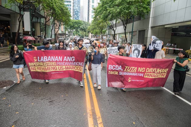 August 19, 2026, Quezon City, Quezon, Philippines: A protest made up of youth groups and progressive sectoral groups marched along the streets of Bonifacio Global City toward the headquarters of the BCDA to reject the proposed Pax Silica. Quezon City Philippines - ZUMAy102 20260819_zip_y102_013 Copyright: xKenosisxYapx