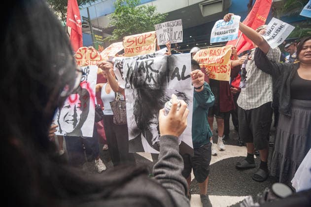 August 19, 2026, Quezon City, Quezon, Philippines: A protest made up of youth groups and progressive sectoral groups marched along the streets of Bonifacio Global City toward the headquarters of the BCDA to reject the proposed Pax Silica. Quezon City Philippines - ZUMAy102 20260819_zip_y102_020 Copyright: xKenosisxYapx