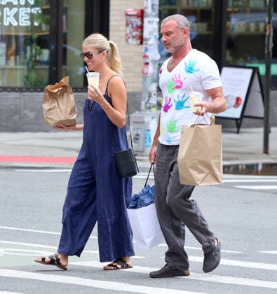 Liev Schreiber With His Wife Out in NYC Actor Liev Schreiber with a funny hand painted tshirt is walking with his wife Taylor Neisen in Soho, New York on August 18, 2026. Photo by Dylan Travis ABACAPRESS.COM New York City New York United States  Copyright: xDylanxTravis ABACAx