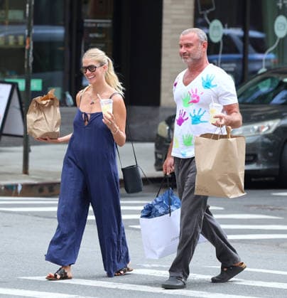 Liev Schreiber With His Wife Out in NYC Actor Liev Schreiber with a funny hand painted tshirt is walking with his wife Taylor Neisen in Soho, New York on August 18, 2026. Photo by Dylan Travis ABACAPRESS.COM New York City New York United States  Copyright: xDylanxTravis ABACAx