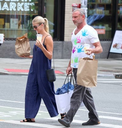 Liev Schreiber With His Wife Out in NYC Actor Liev Schreiber with a funny hand painted tshirt is walking with his wife Taylor Neisen in Soho, New York on August 18, 2026. Photo by Dylan Travis ABACAPRESS.COM New York City New York United States  Copyright: xDylanxTravis ABACAx