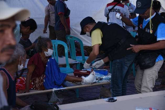 Aftermath of 7.7-magnitude earthquake in Indonesia EAST NUSA TENGGARA, INDONESIA - AUGUST 19: (----EDITORIAL USE ONLY - MANDATORY CREDIT - INDONESIAN NATIONAL SEARCH AND RESCUE AGENCY (BASARNAS) HANDOUT - NO MARKETING NO ADVERTISING CAMPAIGNS - DISTRIBUTED AS A SERVICE TO CLIENTS----) People receive treatments as search and rescue teams continue clearing and searching collapsed buildings in the area for possible victims trapped under the rubble following a powerful earthquake in Lamba Leda, East Nusa Tenggara, Indonesia, on August 19, 2026. BASARNAS Handout Anadolu East Nusa Tenggara Indonesia. Editorial use only. Please get in touch for any other usage.  Copyright: x2026xAnadoluxBASARNASx xHandoutx