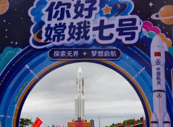 (260819) -- WENCHANG, Aug. 19, 2026 -- This photo taken on Aug. 19, 2026 shows the combination of the Chang e-7 lunar probe and the Long March-5 Y14 carrier rocket being transferred vertically to the launching area at the Wenchang Spacecraft Launch Site in south China s Hainan Province. The Chang e-7 lunar probe is scheduled for launch at an appropriate time, according to the China Manned Space Agency (CMSA). The combination of the Chang e-7 lunar probe and the Long March-5 Y14 carrier rocket was transferred vertically on Wednesday to the launching area at the Wenchang Spacecraft Launch Site in south China s Hainan Province, the CMSA said. The lunar probe and rocket had arrived at the launch site in April and July, respectively, and 