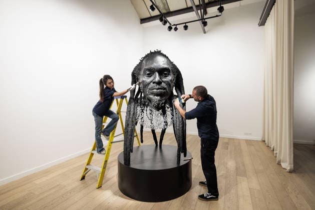 Benjamin Zephaniah sculpture Benjamin Zephaniah sculpture A sculpture of Benjamin Zephaniah by George Triggs is prepared for display at TM Gallery, London as part of a forthcoming exhibition opening 19 August to 30 September. Sculptor George Triggs who is dusting and polishing with bushes Along with Sculptor George Triggs who is dusting and polishing  Copyright: xVickixCouchmanx NINTCHDBPICT001101965392
