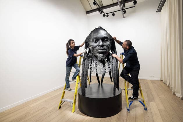 Benjamin Zephaniah sculpture Benjamin Zephaniah sculpture A sculpture of Benjamin Zephaniah by George Triggs is prepared for display at TM Gallery, London as part of a forthcoming exhibition opening 19 August to 30 September. Sculptor George Triggs who is dusting and polishing with bushes Along with Sculptor George Triggs who is dusting and polishing  Copyright: xVickixCouchmanx NINTCHDBPICT001101965386