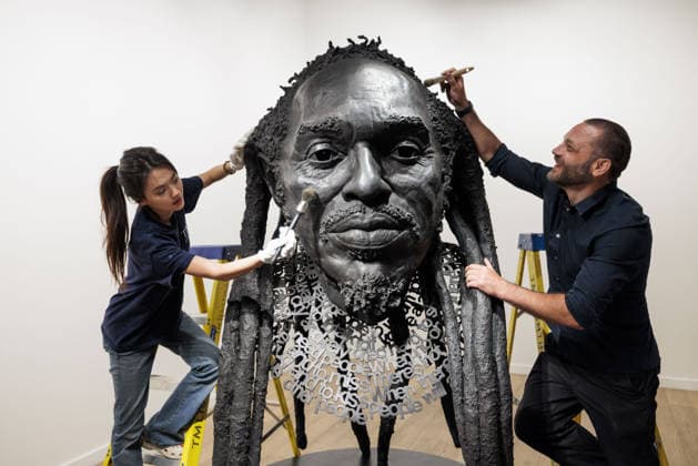 Benjamin Zephaniah sculpture Benjamin Zephaniah sculpture A sculpture of Benjamin Zephaniah by George Triggs is prepared for display at TM Gallery, London as part of a forthcoming exhibition opening 19 August to 30 September. Sculptor George Triggs who is dusting and polishing with bushes Along with Sculptor George Triggs who is dusting and polishing  Copyright: xVickixCouchmanx NINTCHDBPICT001101965419
