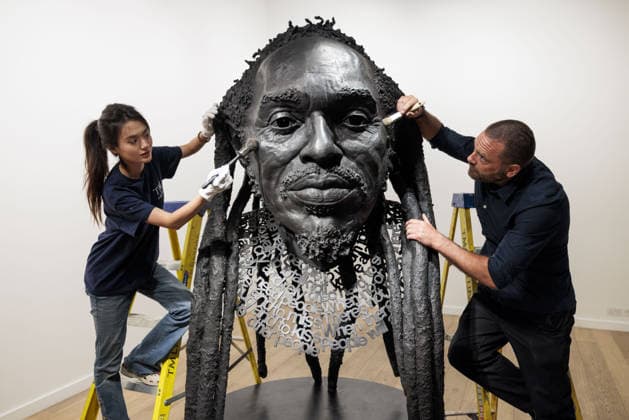 Benjamin Zephaniah sculpture Benjamin Zephaniah sculpture A sculpture of Benjamin Zephaniah by George Triggs is prepared for display at TM Gallery, London as part of a forthcoming exhibition opening 19 August to 30 September. Sculptor George Triggs who is dusting and polishing with bushes Along with Sculptor George Triggs who is dusting and polishing  Copyright: xVickixCouchmanx NINTCHDBPICT001101965434