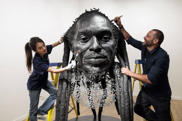 Benjamin Zephaniah sculpture Benjamin Zephaniah sculpture A sculpture of Benjamin Zephaniah by George Triggs is prepared for display at TM Gallery, London as part of a forthcoming exhibition opening 19 August to 30 September. Sculptor George Triggs who is dusting and polishing with bushes Along with Sculptor George Triggs who is dusting and polishing  Copyright: xVickixCouchmanx NINTCHDBPICT001101965470