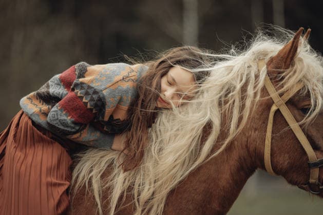 A young girl in a cozy patterned sweater and brown pleated skirt is Solnechnogorsk, Moscow Oblast, Russia CR_DGAM260812-2105294-01 ,model released, Symbolfoto ,property released