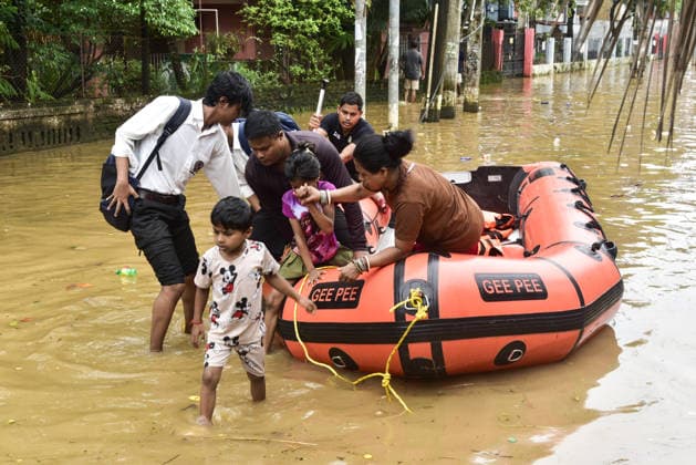 Heavy rainfall in India s Guwahati GUWAHATI, INDIA - AUGUST 19: People navigate through a waterlogged street on an inflatable boat following heavy rainfall in Guwahati, Assam state, India, on August 19, 2026. The severe monsoon downpour triggered widespread flash flooding and waterlogging across multiple neighborhoods, disrupting normal life and forcing residents to use makeshift watercraft and boats for daily transportation. Hafiz Ahmed Anadolu Guwahati India. Editorial use only. Please get in touch for any other usage.  Copyright: x2026xAnadoluxHafizxAhmedx